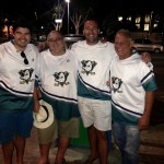 4 rugby guys in Anaheim Mighty Duck jerseys.